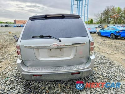 Zdjęcie 6 z 12 samochodu: 2005 CHEVROLET EQUINOX LT VIN:2CNDL73F056039716 - miniatura