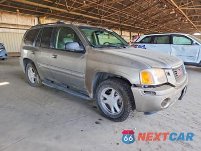 Czwarte zdjęcie samochodu z boku: 2003 GMC ENVOY VIN:1GKDT13S932145398 - miniatura