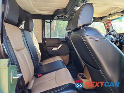 Zdjęcie 11 z 12 samochodu: 2014 JEEP WRANGLER UNLIMITED SAHARA VIN:1C4HJWEG8EL117971 - miniatura