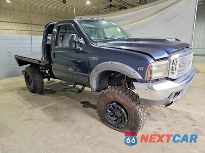 Czwarte zdjęcie samochodu z boku: 2000 FORD F250 SUPER DUTY VIN:1FTNF21L3YEC02239 - miniatura