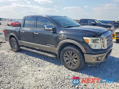 Czwarte zdjęcie samochodu z boku: 2017 NISSAN TITAN PLATINUM RESERVE VIN:1N6AA1E68HN520365 - miniatura