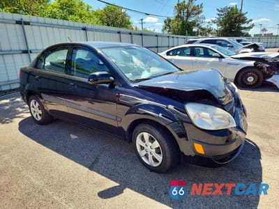 Czwarte zdjęcie samochodu z boku: 2009 KIA RIO BASE VIN:KNADE223396469743 - miniatura