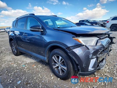 Czwarte zdjęcie samochodu z boku: 2018 TOYOTA RAV4 XLE VIN:2T3RFREV9JW703513 - miniatura