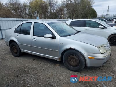Czwarte zdjęcie samochodu z boku: 2000 VOLKSWAGEN JETTA GLS TDI VIN:3VWSF29M8YM046769 - miniatura