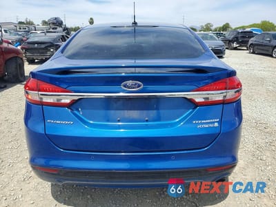 Zdjęcie 6 z 12 samochodu: 2017 FORD FUSION TITANIUM HEV VIN:3FA6P0RU8HR382209 - miniatura
