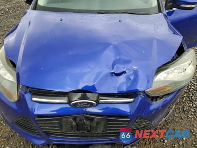 Zdjęcie 11 z 11 samochodu: 2014 FORD FOCUS TITANIUM VIN:1FADP3J20EL230468 - miniatura