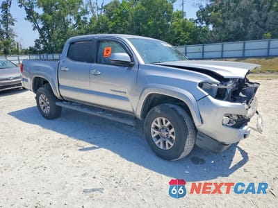 Czwarte zdjęcie samochodu z boku: 2018 TOYOTA TACOMA SR5 V6 VIN:5TFAZ5CN8JX067601 - miniatura