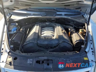 Zdjęcie 12 z 12 samochodu: 2006 VOLKSWAGEN TOUAREG 4.2 VIN:WVGZM77L16D054733 - miniatura