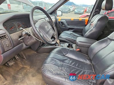 Zdjęcie 7 z 13 samochodu: 2001 JEEP GRAND CHEROKEE LAREDO VIN:1J4GW48S41C509187 - miniatura