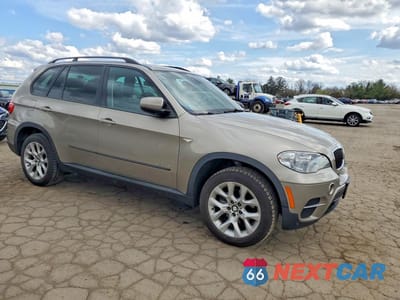 Czwarte zdjęcie samochodu z boku: 2012 BMW X5 XDRIVE35I VIN:5UXZV4C50CL890105 - miniatura