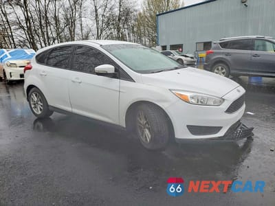 Czwarte zdjęcie samochodu z boku: 2017 FORD FOCUS SE VIN:1FADP3K20HL246544 - miniatura