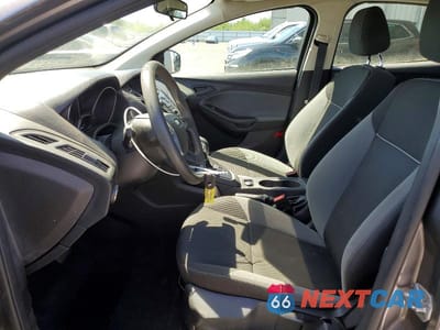 Zdjęcie 7 z 12 samochodu: 2014 FORD FOCUS S VIN:1FADP3E25EL132403 - miniatura