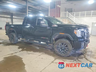 Czwarte zdjęcie samochodu z boku: 2023 GMC SIERRA K3500 AT4 VIN:1GT49VEY7PF197291 - miniatura