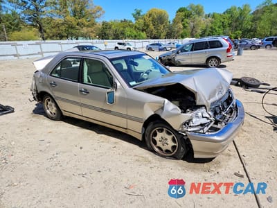 Czwarte zdjęcie samochodu z boku: 1999 MERCEDES-BENZ C 230 VIN:WDBHA24G8XA664780 - miniatura