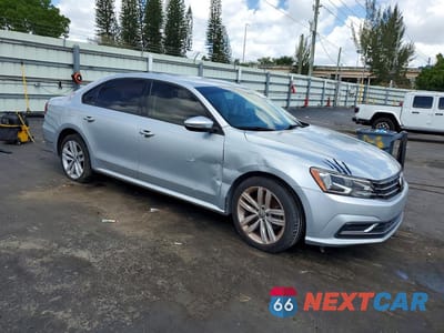 Czwarte zdjęcie samochodu z boku: 2018 VOLKSWAGEN PASSAT S VIN:1VWAA7A32JC023716 - miniatura