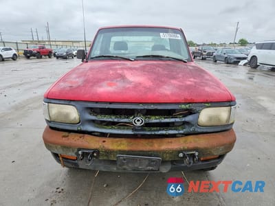 Piąte zdjęcie samochodu w środku: 1995 MAZDA B2300 VIN:4F4CR13A5STM10282 - miniatura