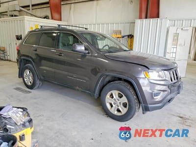 Czwarte zdjęcie samochodu z boku: 2014 JEEP GRAND CHEROKEE LAREDO VIN:1C4RJFAGXEC392459 - miniatura