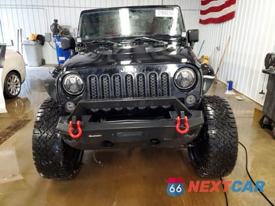 Piąte zdjęcie samochodu w środku: 2013 JEEP WRANGLER UNLIMITED RUBICON VIN:1C4HJWFG5DL651684 - miniatura