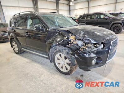 Czwarte zdjęcie samochodu z boku: 2010 MITSUBISHI OUTLANDER SE VIN:JA4JT3AW8AZ002781 - miniatura