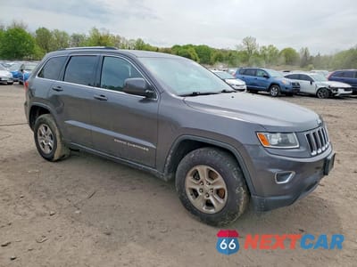 Czwarte zdjęcie samochodu z boku: 2014 JEEP GRAND CHEROKEE LAREDO VIN:1C4RJFAGXEC383969 - miniatura