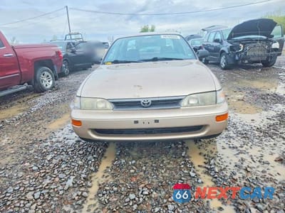 Piąte zdjęcie samochodu w środku: 1994 TOYOTA COROLLA BASE VIN:1NXAE04B2RZ181654 - miniatura