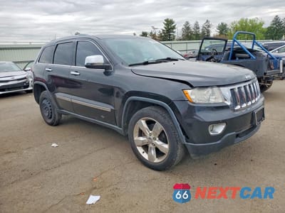 Czwarte zdjęcie samochodu z boku: 2012 JEEP GRAND CHEROKEE LAREDO VIN:1C4RJFAG5CC221485 - miniatura