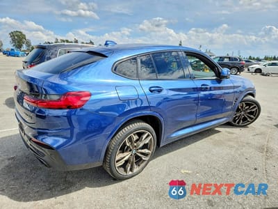Trzecie zdjęcie samochodu z tyłu: 2021 BMW X4 XDRIVEM40I VIN:5UX2V5C00M9D85386 - miniatura