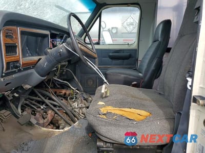 Zdjęcie 7 z 12 samochodu: 1990 FORD SHUTTLE BUS VIN:1FDKE30H7LHA73417 - miniatura