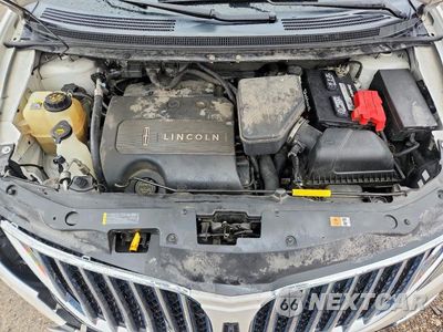 Zdjęcie 12 z 13 samochodu: 2014 LINCOLN MKX VIN:2LMDJ8JK8EBL16703 - miniatura