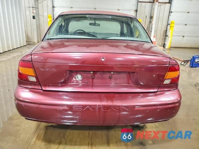 Zdjęcie 6 z 13 samochodu: 2002 SATURN SL1 VIN:1G8ZH54862Z257153 - miniatura