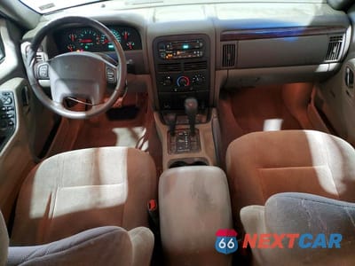 Zdjęcie 8 z 13 samochodu: 2000 JEEP GRAND CHEROKEE LAREDO VIN:1J4GW48S6YC154257 - miniatura