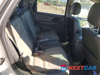 Zdjęcie 11 z 13 samochodu: 2003 FORD ESCAPE XLT VIN:1FMYU03193KA42229 - miniatura