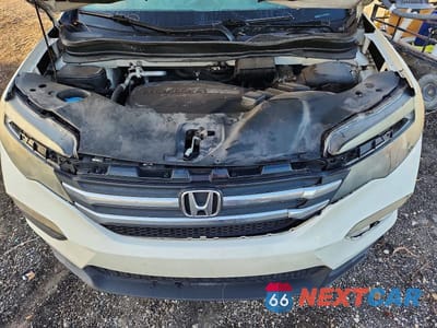 Zdjęcie 12 z 13 samochodu: 2017 HONDA PILOT LX VIN:5FNYF5H13HB009106 - miniatura
