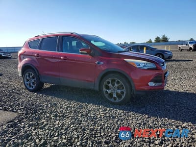 Czwarte zdjęcie samochodu z boku: 2014 FORD ESCAPE TITANIUM VIN:1FMCU0JX3EUA12314 - miniatura