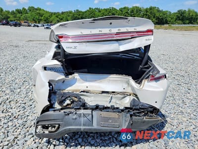 Zdjęcie 6 z 12 samochodu: 2016 LINCOLN MKZ HYBRID VIN:3LN6L2LU3GR612694 - miniatura
