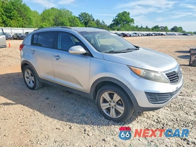 Czwarte zdjęcie samochodu z boku: 2012 KIA SPORTAGE LX VIN:KNDPB3A27C7287990 - miniatura
