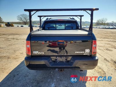 Zdjęcie 6 z 12 samochodu: 2010 HONDA RIDGELINE RTL VIN:5FPYK1F53AB001143 - miniatura