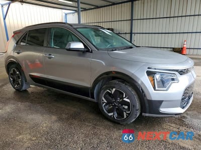 Czwarte zdjęcie samochodu z boku: 2023 KIA NIRO WIND VIN:KNDCR3L17P5072397 - miniatura