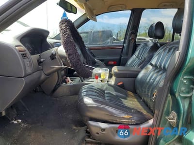 Zdjęcie 7 z 13 samochodu: 2000 JEEP GRAND CHEROKEE LIMITED VIN:1J4GW58S2YC140605 - miniatura