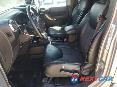 Zdjęcie 7 z 12 samochodu: 2013 JEEP WRANGLER UNLIMITED SPORT VIN:1C4HJWDG3DL591052 - miniatura