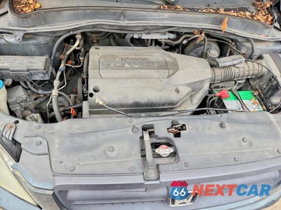 Zdjęcie 12 z 12 samochodu: 2003 HONDA PILOT EXL VIN:2HKYF18623H592184 - miniatura