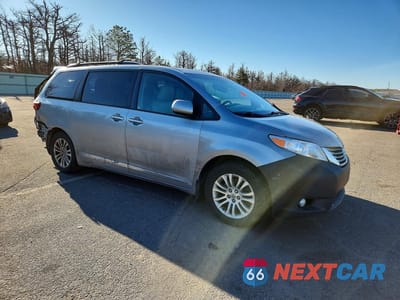 Czwarte zdjęcie samochodu z boku: 2016 TOYOTA SIENNA XLE 8-PASSENGER VIN:5TDYK3DC6GS743062 - miniatura