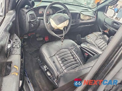 Zdjęcie 8 z 13 samochodu: 2000 FORD F150 VIN:2FTRX07L2YCB02326 - miniatura