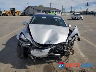 Piąte zdjęcie samochodu w środku: 2018 TESLA MODEL 3 VIN:5YJ3E1EA2JF006987 - miniatura