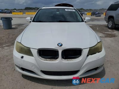 Piąte zdjęcie samochodu w środku: 2011 BMW 328 XI SULEV VIN:WBAPK5C51BF124112 - miniatura