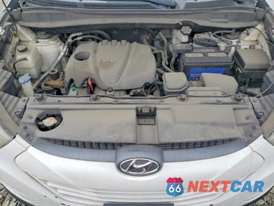 Zdjęcie 12 z 13 samochodu: 2014 HYUNDAI TUCSON VIN:KM8JUCAG6EU793466 - miniatura