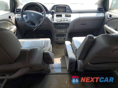 Zdjęcie 8 z 14 samochodu: 2010 HONDA ODYSSEY EXL VIN:5FNRL3H73AB018769 - miniatura