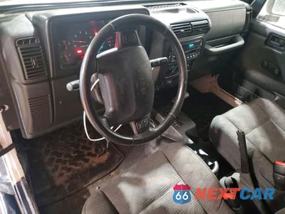 Zdjęcie 8 z 13 samochodu: 2003 JEEP WRANGLER COMMANDO VIN:1J4FA39S63P311192 - miniatura
