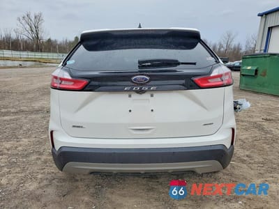 Zdjęcie 6 z 14 samochodu: 2022 FORD EDGE SEL VIN:2FMPK4J96NBA01894 - miniatura