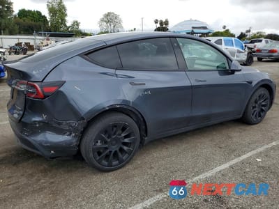 Trzecie zdjęcie samochodu z tyłu: 2022 TESLA MODEL Y VIN:7SAYGDEE8NF508156 - miniatura